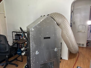 The vacuum cleaner for the air duct.  Photo taken by and the property of FourWalls.