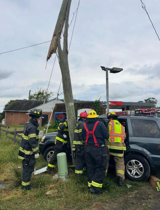 Firefighters in Isle Of Wight Virginia rescue a woman driver who was in an auto accident