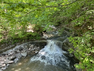 McCormick’s Creek Canyon Falls, McCormick’s Creek State Park, Spencer, Indiana.  Photo taken by and the property of FourWalls.