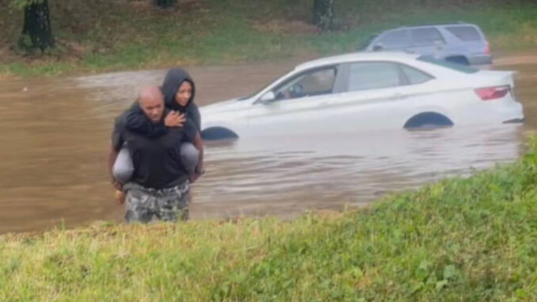 Atlanta resident Georgia Brathwaite rescues a woman driver who was trapped in floodwater Atlanta resident Georgia Brathwaite rescues a woman driver who was trapped in floodwater