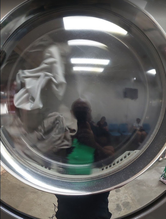 Photo is mine. Laundry selfie!