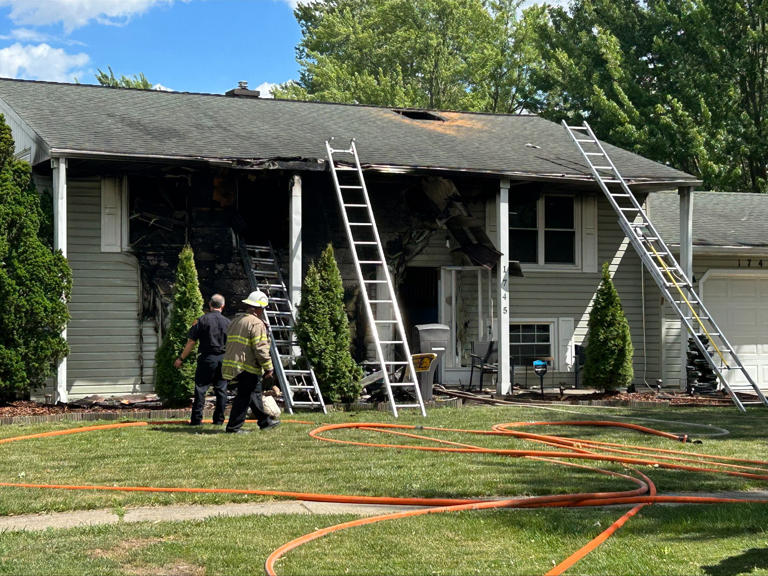 Firefighters in Toledo Ohio rescue a dog that was inside of a house on fire Firefighters in Toledo Ohio rescue a dog that was inside of a house on fire
