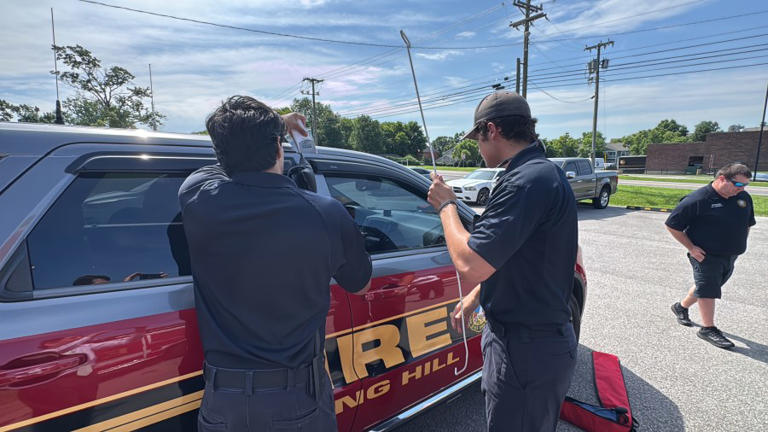 Spring Hill Fire Department rescues a dog that was inside an auto that was hot. Spring Hill Fire Department rescues a dog that was inside an auto that was hot.