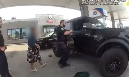 Dearborn Michigan police officers rescue a one month baby who was inside an auto Dearborn Michigan police officers rescue a one month baby who was inside an auto