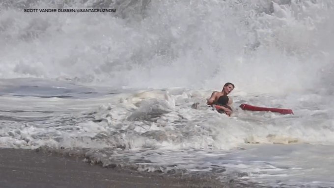 Lifeguards in Santa Cruz California rescue a swimmer who was in the ocean. Lifeguards in Santa Cruz California rescue a swimmer who was in the ocean.