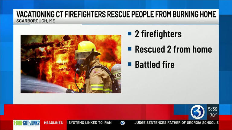 Firefighters in Scarborough Maine rescue 2 person who in a house on fire Firefighters in Scarborough Maine rescue 2 person who in a house on fire