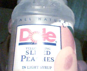 dole peaches  - empty jar of dole peaches