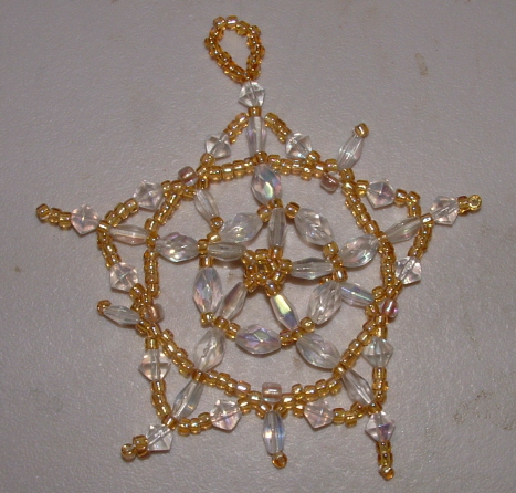 snowflake star ornament - hand beaded snowflake star tree ornament.