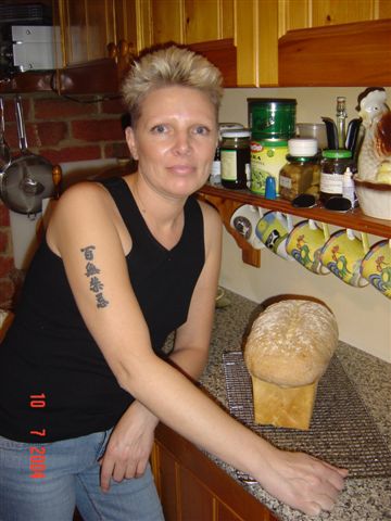 Bread Making the old fashioned way - This is me making bread in the woodburner. It gives everything a lovely flavour - don't know why. It's hard work what with all the kneading etc, but good excercise for the arms! Tastes pretty good too.