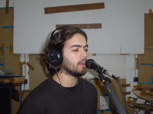 i'm singing! be afraid! lol - recording a home made demo tape for my band! a long time ago!