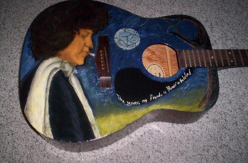 Bob Dylan on guitar - I painted this picture with acrylics on an acoustic guitar.  It turned out alright.