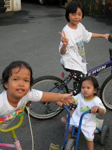 Riding bicycle - My baby riding bicycle with her aunties at her great grandmother house…