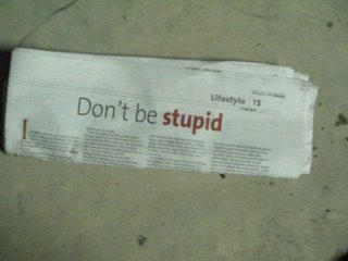 Don't be stupid - Took a picture of the local newspaper.  It says, Don't BE STUPID!