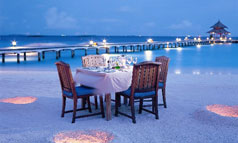 Banyan Tree Maldives Dining - Floating on the blue waters of the south-eastern Indian Ocean is a garland of islands of astounding beauty... where time almost stands still and from where returning back to the world of mundane affairs is as excruciating as being torn away from the womb. This paradise on earth, called the Maldives, is a dream come true to those in search of exotic travel destinations. Its all inclusive resorts are home to globe trotters nearly all year round. If you worship beauty, there's no place like Maldives to sing paeans to!