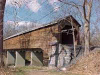 Meems Bottom Covered Bridge VA - Today, Meems Bottom Bridge is the last remaining covered bridge in Virginia maintained by the Department of Transportation for public use as a throughway.

The bridge has over a 200-foot single span Burr arch truss, which makes it the longest covered bridge still standing in Virginia.