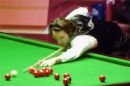 Playing Snooker - Photo shows snooker player lining up his next shot.