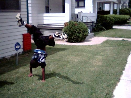 my son doing a head stand - my son doing an head stand