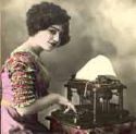 Typist - Woman typing on a non-electric typewriter.