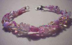 A Handmade Bracelet that I have made....It also so - Handmade Beaded Bracelet with pink seed beads and rose quartz.