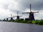 windmills - four windmills sdtanding behind each other.