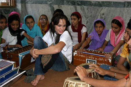 Volunteer celebrity - Angelina Jolie took a break from shooting A Mighty Heart, the movie based on the life of slain journalist Daniel Pearl, to Visit New Delhi. She was in the capital to play another role—that of goodwill ambassador of the United Nations High Commissioner for Refugees.  On November 4, she and her 5-year-old son Maddox toured an Afghan Sikh refugee camp, listening to children play religious music and chatting with students.