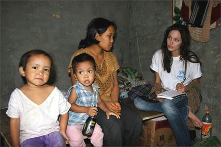 Angelina jolie - Angelina Jolie also visited the one-room home where a refugee from Myanmar lives with her three children. According to statement, the woman, one of the 1,750 refugees who have fled Myanmar to India since 1982, told Jolie that she and her children left after her husband was arrested by the military government in Myanmar.