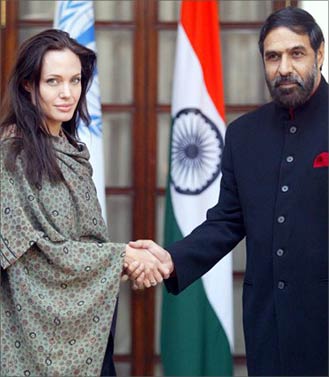 Jolie with Minister - On 5/11/06, on Sunday, Jolie met Indian Junior External Affairs Minister Anand Sharma and lauded India's help to the refugees. ''The wonderful thing that I have learned since I have been in India is there are many, many needs for your own people and yet you have all been so gracious and so open to so many refugees over the years,'' she said.