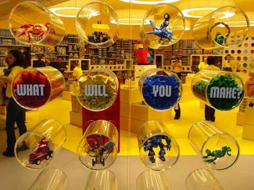 Lego Land - They're just small, brightly colored pieces of plastic, right? Wrong. Legos are enduringly popular toy bricks and more that for a half-century have fueled the imaginations of everyone from preschoolers to craft-minded adults. The sign on this wall at a Lego store in New Jersey sums it up in just four words: What will you make?   The people who make the Legos in the first place, however, are facing an uncomfortable change. Lego Group, based in Billund, Denmark, will be relocating most of its manufacturing jobs to factories in Mexico and the Czech Republic between now and 2009, according to a story in The New York Times. Design and marketing employees will remain in Billund.   For photo galleries on those who are, or would be, master Lego builders, see 'Inside the Legoland model shop,' 'Crowning the newest Lego master' and 'Going for the Lego gold.' For galleries on Lego robots, see 'Lego lands in Redmond' and 'Building blocks for bots.'