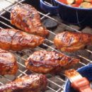 Barbecued Chicken - photo of man tending to barbaque