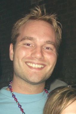 mardi Gras 2006 - Blue eyes, blonde hair, male, blue shirt, mardi gras beads, with friends in the French Quarter