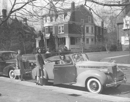 car - Name:   	 packard.jpg Photographer: 	 Nancy T Caption: 	 4 sisters and their 1936 Packard Location: 	 Wilmington, Delaware Date Taken: 	 1936
