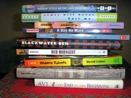 books - Name:   	 books1.jpg Photographer: 	 Jim Wenzloff Caption: 	 Looking for a good book. Location: 	 Port Huron Michigan Date Taken: 	 Dec. 2004