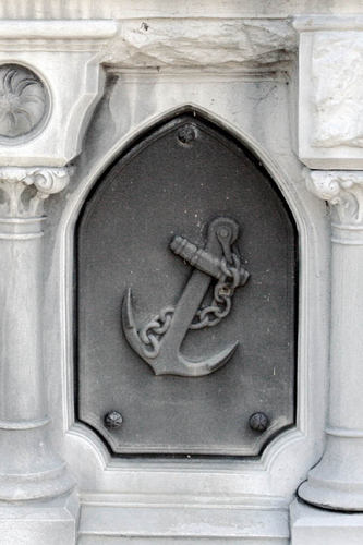 Meanings of Common Tombstone Symbols & Icons - Have you ever wandered through a cemetery and wondered about the meanings of the designs carved on old gravestones? Thousands of different religious and secular symbols and emblems have adorned tombstones through the ages, indicating attitudes towards death and the hereafter, membership in a fraternal or social organization, or an individual's trade, occupation or even ethnic identity. While many of these tombstone symbols have fairly simple interpretations, it is not always easy to determine their meaning and significance. We were not present when these symbols were carved into the stone and can't claim to know our ancestors' intentions. They may have included a particular symbol for no other reason than because they thought it was pretty.  The engravings stand out sharply on this zinc tombstone in Malta Ridge Cemetery in Saratoga County, New York.   The anchor also represents the anchoring influence of Christ. Some say it was used as a sort of disguised cross. The anchor also serves as a symbol for seamanship and may mark the grave of a seaman, or be used as a tribute to St. Nicholas, patron saint of seamen. And anchor with a broken chain symbolizes the cessation of life.