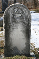 Meanings of Common Tombstone Symbols & Icons - Have you ever wandered through a cemetery and wondered about the meanings of the designs carved on old gravestones? Thousands of different religious and secular symbols and emblems have adorned tombstones through the ages, indicating attitudes towards death and the hereafter, membership in a fraternal or social organization, or an individual's trade, occupation or even ethnic identity. While many of these tombstone symbols have fairly simple interpretations, it is not always easy to determine their meaning and significance. We were not present when these symbols were carved into the stone and can't claim to know our ancestors' intentions. They may have included a particular symbol for no other reason than because they thought it was pretty.  While we can only speculate what our ancestors were trying to tell us through their choice of tombstone art, these symbols and their interpretations are commonly agreed upon by gravestone scholars.      A symbol reminiscent of the Victorian era, the calla lilly represents majestic beauty and is often used to represent marriage or resurrection.