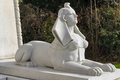 Sphinx - Have you ever wandered through a cemetery and wondered about the meanings of the designs carved on old gravestones? Thousands of different religious and secular symbols and emblems have adorned tombstones through the ages, indicating attitudes towards death and the hereafter, membership in a fraternal or social organization, or an individual's trade, occupation or even ethnic identity. While many of these tombstone symbols have fairly simple interpretations, it is not always easy to determine their meaning and significance. We were not present when these symbols were carved into the stone and can't claim to know our ancestors' intentions. They may have included a particular symbol for no other reason than because they thought it was pretty.  While we can only speculate what our ancestors were trying to tell us through their choice of tombstone art, these symbols and their interpretations are commonly agreed upon by gravestone scholars.     The Sphinx, featuring the head and torso of a human grafted to the body of a lion, guards the tomb.