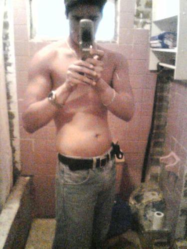 Bathroom photo - Me taking a picture in the mirror of a bathroom