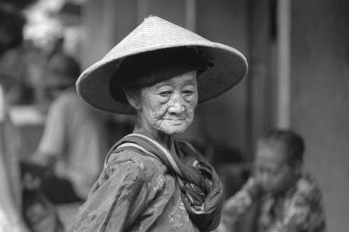 old woman - old woman in pundong traditional market, Central of Java, Indonesia.