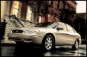 love my car - I love the ford taurus gets good gas miles