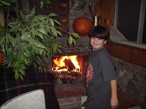 My Grandson - This is my Granson in front of the fireplace at Christmas last year.