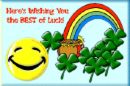 I Wish You Luck! - Here's wishing you the best of luck message with a happy face, four leaf clovers and pot of gold at the end of the rainbow.