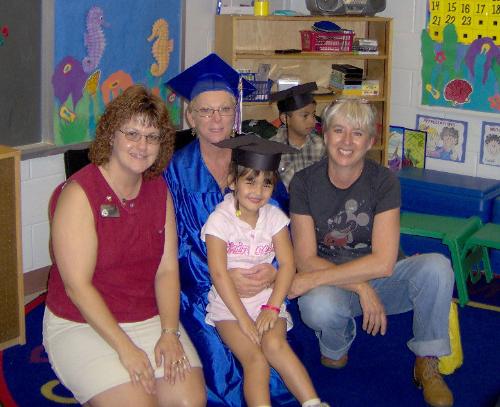 My daughter and all her pre k teachers - This is a picture of my daughter and all her pre k teachers.