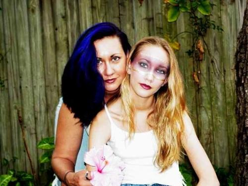 My daughter and myself - I know this isn't a great pic of me, but it is a pic that shows my hair when I turned it blue. It is now purple though. :)