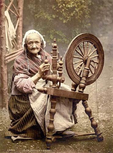 'SPINNING WHEEL' - PHOTO OF AN IRISH WOMEN AT SPINNING WHEEL'