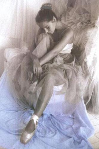 the ballerina - i love the way she sitting , so graceful and elegant.