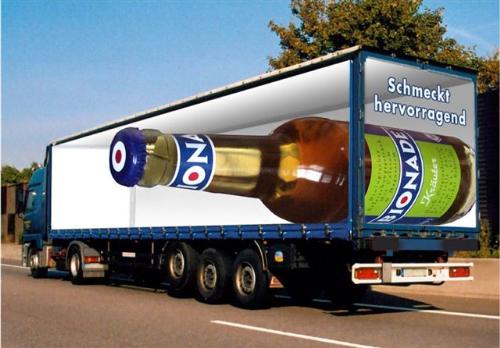 illusion - this is nice photo to see..... this creates the illusion that bottle in the truck is piercing its side