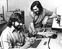 APPLE Computers - Steve Woznaik(sitting) and Steve Jobs of APPLE Computers.He was three months late in filing a name for the business because he didn't get any better name for his new company. So one day he told to the staff: 'If I'll not get better name by 5 o'clcok today, our company's name will be anything he likes...' so at 5 o'clcok nobody comeup with better name, and he was eating APPLE that time... so he keep the name of the company 'Apple Computers'