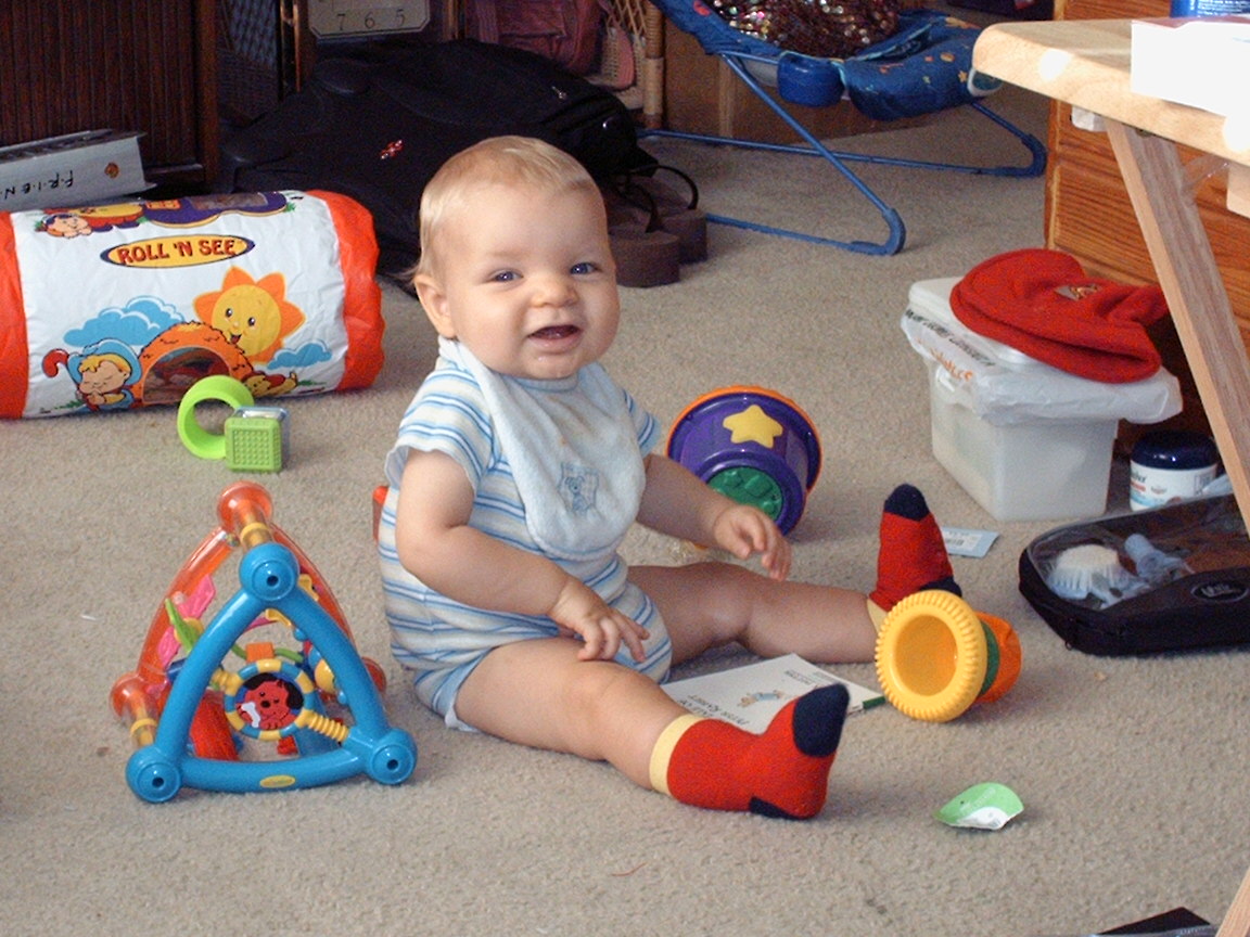 Red Socks! - Nope, not baseball...but look at that baby's red socks!