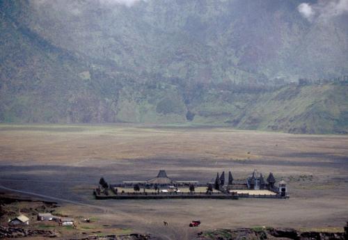 Monastery - Monastery. Looking down on the Monastery from Bromo's rim., showing the sand sea & caldera.