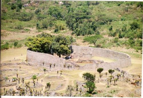 Great Zimbabwe - GREAT ZIMBABWE The ruined city of Great Zimbabwe, near Masvingo, is the largest and most significant ancient monument south of the Sahara. The towering 'stone houses' (dzimba dzembabwe) are the remains of a city of 20 000 shona- speaking people which prospered between the 12th and 15th centuries. The grand concept is an eloquent testament to the advanced culture of its African builders. A beautiful stylised soapstone fish eagle now the national emblem, was found in the ruins. The sculpture has pride of place in the site museum. The whole complex extends across 270 hectares and a whole day visit is strongly recommended. Great Zimbabwe On top of the hill, a dry stone citadel set among giant boulders overlooks the valley. It is a breathtaking view. Down below is an enclosure 250m in diameter with double walls up to 100m high, a great conical tower, smaller towers and many lesser enclosures linked to sunken passageways and walls. Everything has been constructed entirely without mortar – a million stones, each one balancing on each other. Nearby Lake Mutirikwi is a popular water sports resort, with excursions to bird Rich Island and pony trekking in the game reserve on the north shore. Visit nearby traditional villages where the true Zimbabwean hospitality awaits you. This is an experience you should never miss.