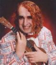 Tiny Tim - Picture of the singer Tiny Tim holding a ukelele